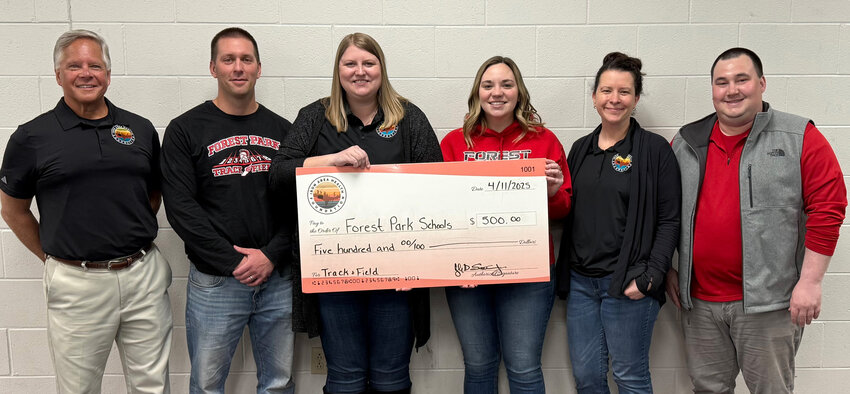 Pictured at the check presentation are, from left, Lyle Smithson Jr. (IAHF Director), Kurt Anderson (IAHF Board Member), Jessica Perry (IAHF Board Member), Kimberly Pekarek (Forest Park Elementary Teacher), Krisitne Rivard (IAHF Board Member) and Zach Hautala (IAHF Board Member).