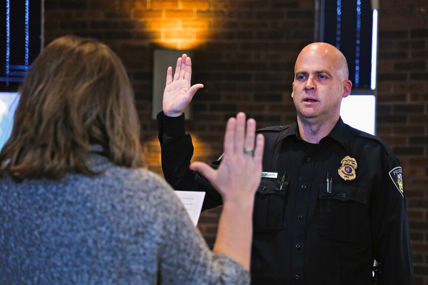 Police Chief Josh Wilson takes the oath of office and is sworn in by Clerk Nicole Ryerson.
Photo courtesy of the New London Police Department..