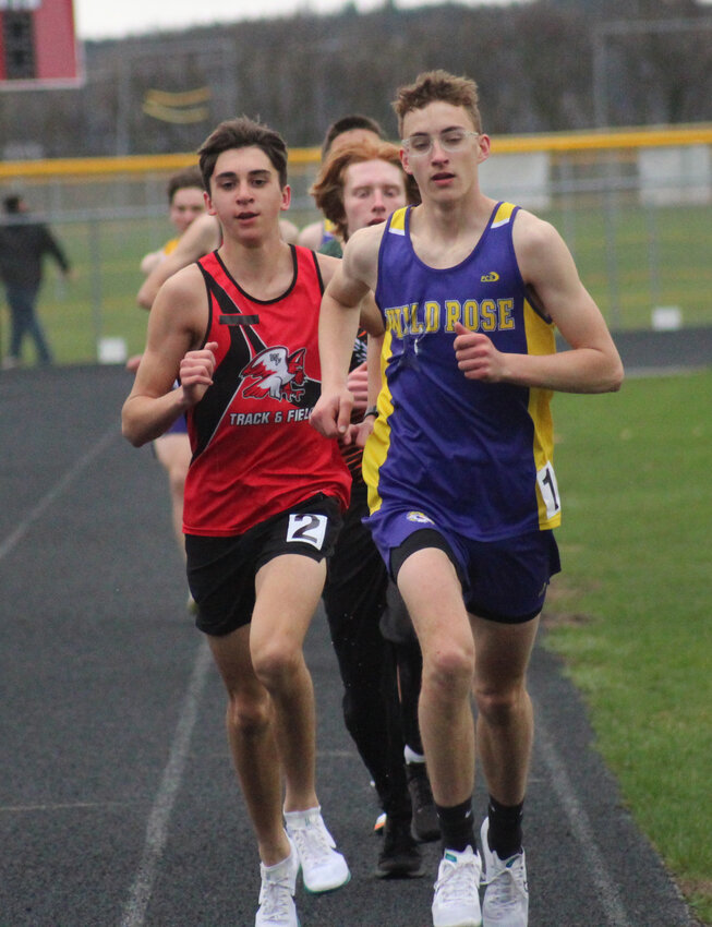 Senior Logan Erdman led the pack on the first lap of the 1600 meter run. Logan finished second in the race.
