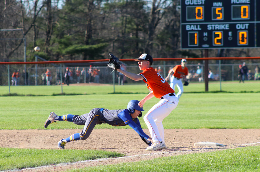 Jett Richard attempts to bunt the ball while stepping up to bat.