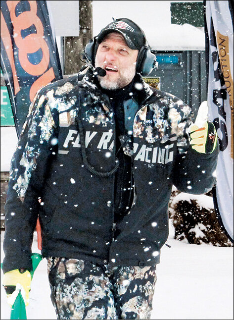 Flagman Todd Persha gives a thumbs up as he stayed busy with finals races all day Sunday.