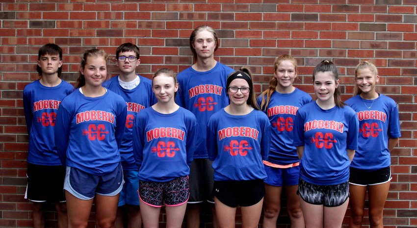 The 2021 Moberly Spartans cross country program consists of senior Malana Pence; and freshmen Kadence Blair, Whitney Fenton and Faith Snodgrass. (Row 2) Sophomore Edmond Roberts, junior Aidan Tustison, freshman Bricen Smith, senior AriAnna Wilkey and junior Anna Rivera. Not shown are sophomores Chlo&eacute; Ross and Derrick Sanders, freshman Lily Barker, head coach Greg Carroll, assistant coaches  Brandy Colbert and Abigail Bartch.