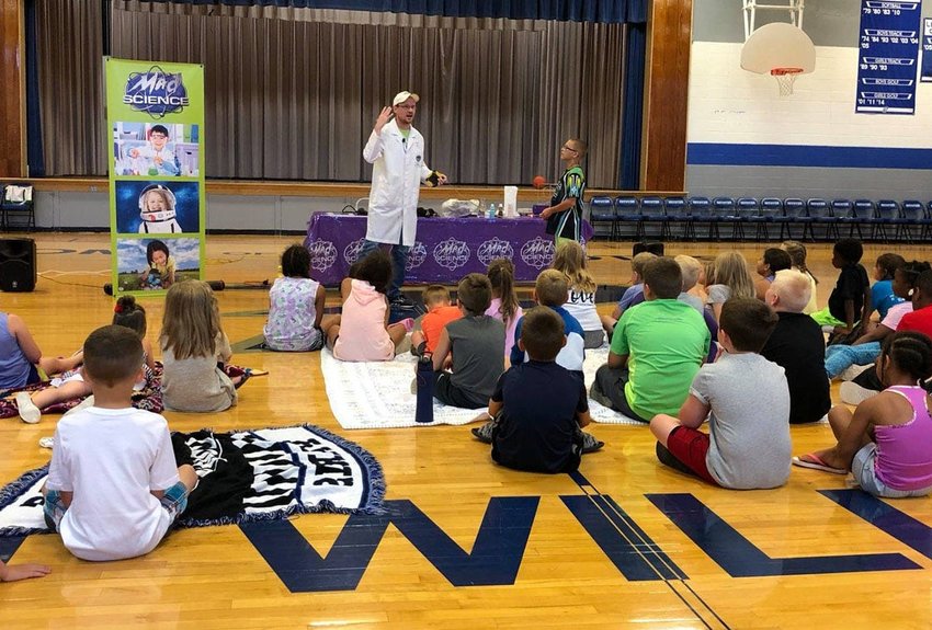 Little Dixie Regional Libraries received a grant from The Institute of Museum &amp;amp; Library Services  and administered by the Missouri State Library Association to bring an educational children's program named Mad Science free of charge to guests at both the Paris High School and Moberly Municipal Auditorium on June 16. Shown above is a Mad Science session held at Paris where more than 100 persons participated and learned through demonstrations about space, gravity, balance and wave lengths were among the science items taught.