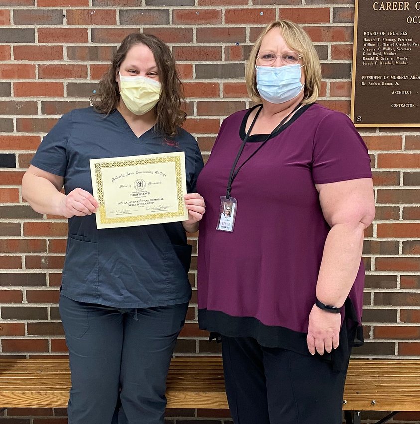 Christi Lewis of Columbia, left, a Moberly Area Community College Associate Degree Nursing Student, is shown with MACC Dean of Health Science upon Lewis receiving the Tom and Fern Swetnam Memorial Scholarship for the 2021 spring semester.