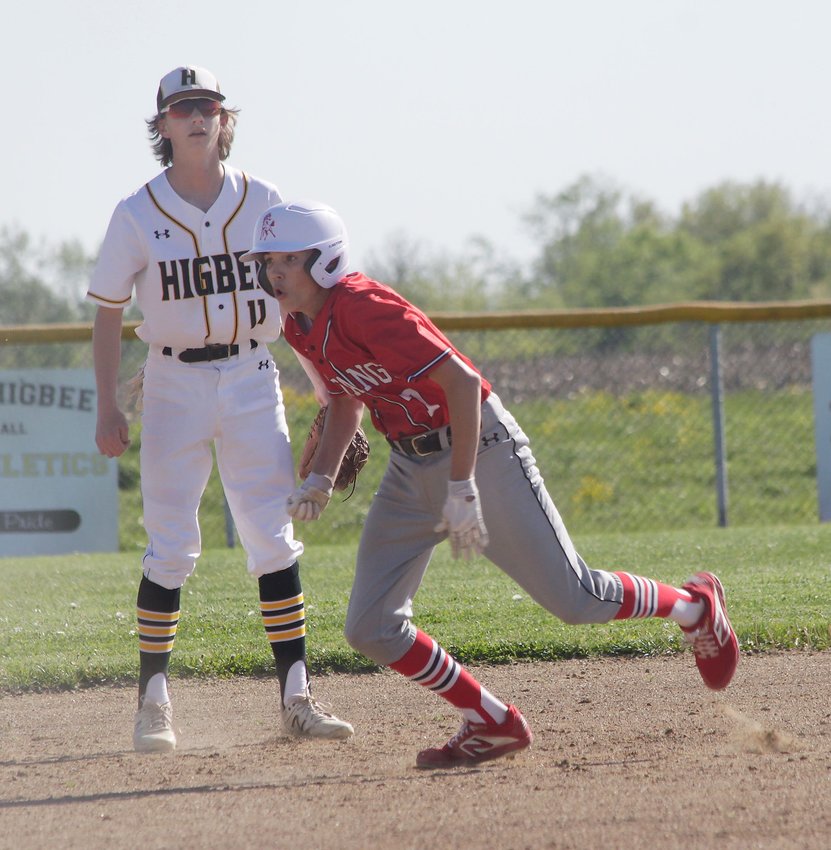 Higbee freshman Derek Rockett is the Tigers starting shortstop and is shown standing behind a base runner during a home baseball game played this 2021 season. Rockett was handed the baseball in Wednesday's district semifinal when the Tigers trailed Braymer 3-0 with one out in the first inning, and Rocket pitched Higbee to an 11-4 triumph the rest of the way while fanning 18 batters.