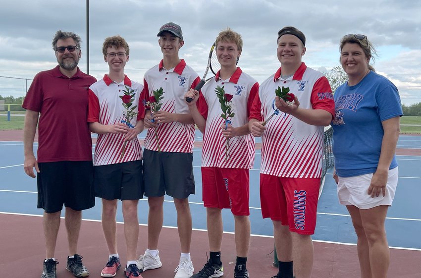 Moberly Spartans boys tennis program recognized its senior players and their parents on senior night held Monday, May 3 when the Spartans competed against Carrollton High School and won 5-4. Shown are Moberly assistant coach Chris Faiella; senior players Nick Faiella, Keegan Steward, Spencer Noone and Carson Wood; head coach Melissa Davidson.
