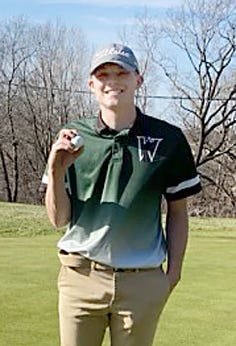 Westran High School senior Caleb Nagel holds the golf ball he used to record his first hole-in-one while playing in his school's home dual meet Thursday, March 26 at Heritage Hills Golf Course in Moberly. Nagel used a 9-iron on the 8th hole which was about 156 yards from the tee.