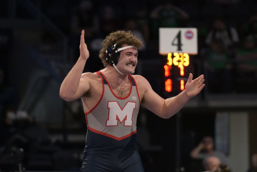 Moberly High School senior Jarrett Kinder celebrates after earning his semifinal win Thursday at the 2021 MSHSAA Class 2 Wrestling Championships held at Cable Dahmer Arena in Independence. Kinder ended up as state runner-up champion at 220-pounds.