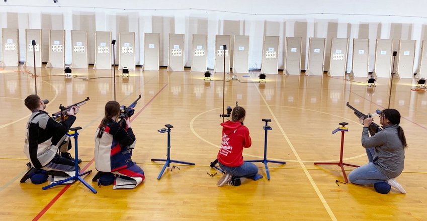 Moberly High School JROTC student cadets take part in an air rifle shooting competition.