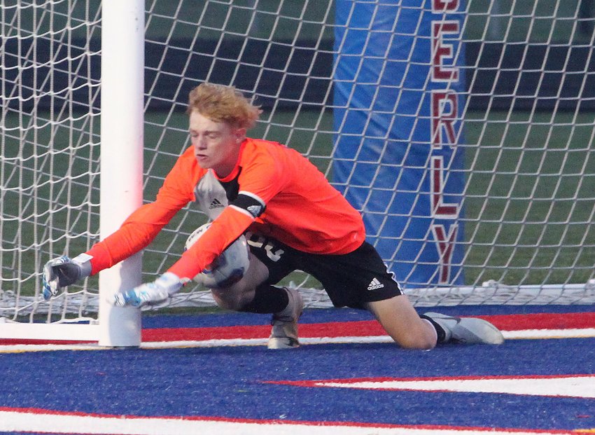 Spartans soccer senior goalkeeper Andrew Imgarten makes a diving stop to prevent an opponent from scoring during a Moberly home game. Moberly (9-7-1) shutout Boonville 8-0 Thursday to guarantee a 2020 winning season heading into district play and snap the progam's six-year losing skid.
