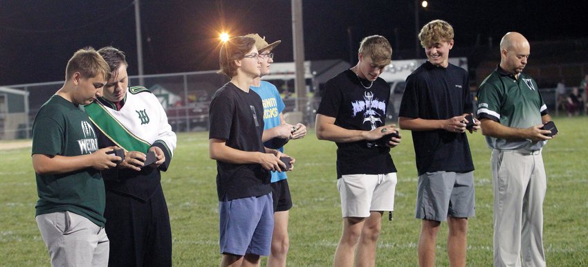Westran High School's 2021 boys spring golf team was honored during halftime of the Sept. 17 home football game against Harrisburg and they received their state championship rings for winning the 2021 MSHSAA Class 1 state championship as a team. Shown are (left) Dillen Wilhite, Aidan Brockleman, Logan Bain, Aidan Seiders, Caleb Nagel, Colin Brandow and Hornets head golf coach Jeff Schleicher.