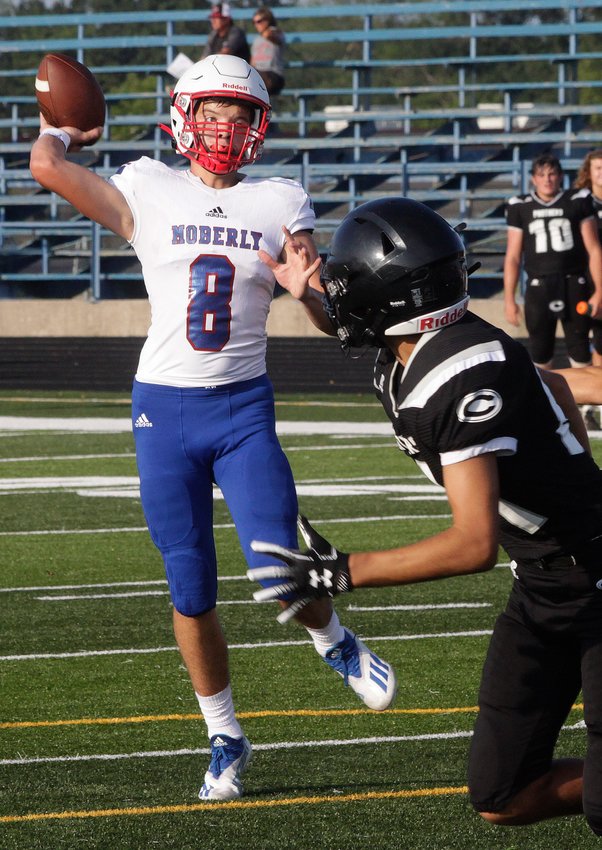 Spartans junior Collin Huffman (6'2, 175) is projected to be the new varsity starting quarterback when Moberly opens its 2021 fall campaign at home Friday against Smith-Cotton High School of Sedalia. Huffman is shown releasing a pass against Centralia during one of the team's scrimmages performed at the Aug. 20 football jamboree held at Dr. Larry K. Noel Spartans Stadium.