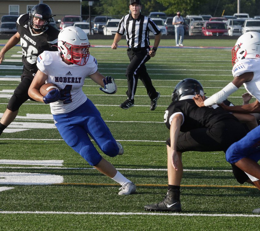 Moberly junior Hunter Boots (#4) looks to stiff-arm a would-be Centralia tackler during a football jamboree hosted Friday, Aug. 20 at Dr. Larry K. Noel Spartans Stadium. The Spartans edged Centralia 2-1 and tied Boonville 1-1 in the scrimmage sessions. Moberly kicks off its 2021 campaign at home Friday, Aug. 27 facing Class 5 Sedalia Smith-Cotton for the sixth straight year.