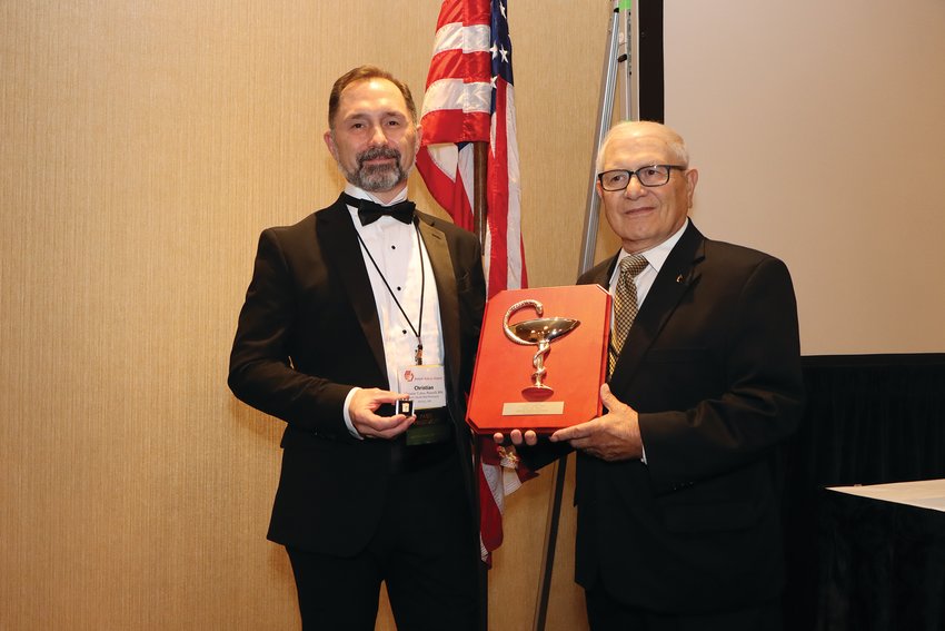 Sam Tadrus, right, is presented the Bowl of Hygeia Award at this year&rsquo;s Joint MPA &amp; IPhA Annual Conference and Trade Show presented by the Missouri Pharmacy Association.