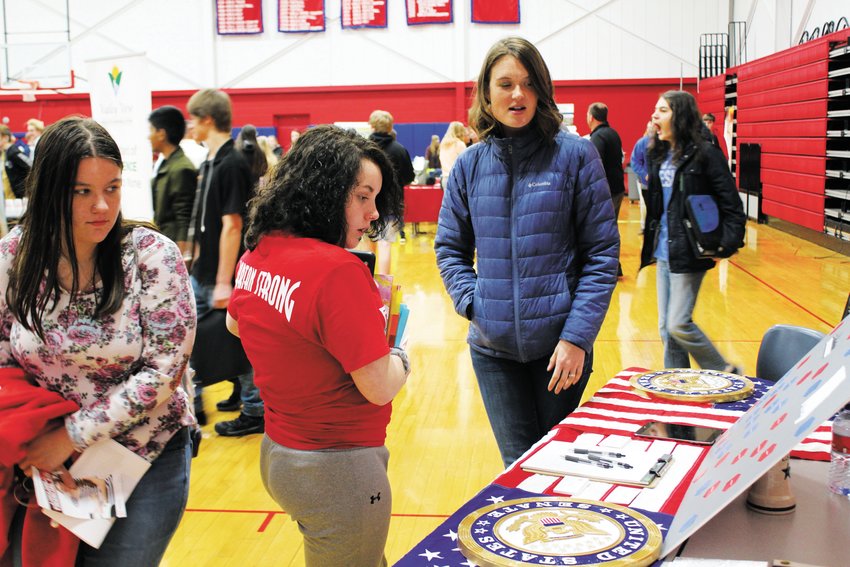 Students peruse the offerings at a table of a past Employer Showcase. This year's event is scheduled for March 2 at the Central Christian College of the Bible.&nbsp;