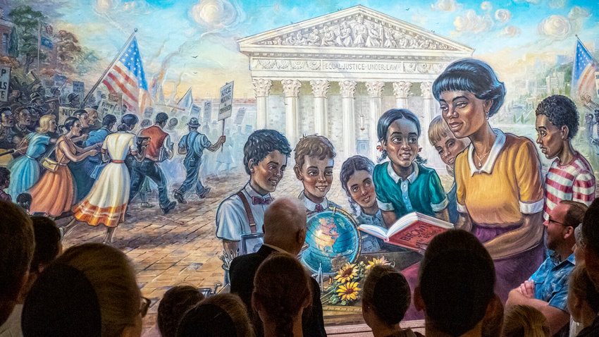 A tour group observes the Brown v. Board mural on the third floor of the Kansas Statehouse, April 26.