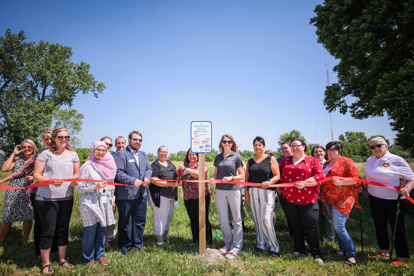 The new Wellness Walk held its ribbon-cutting Tuesday, June 21 at the start of the walk on Shepherd Brothers Boulevard. The Wellness Walk was established by the Building Communities for Better Health Coalition to increase physical activity around Moberly.