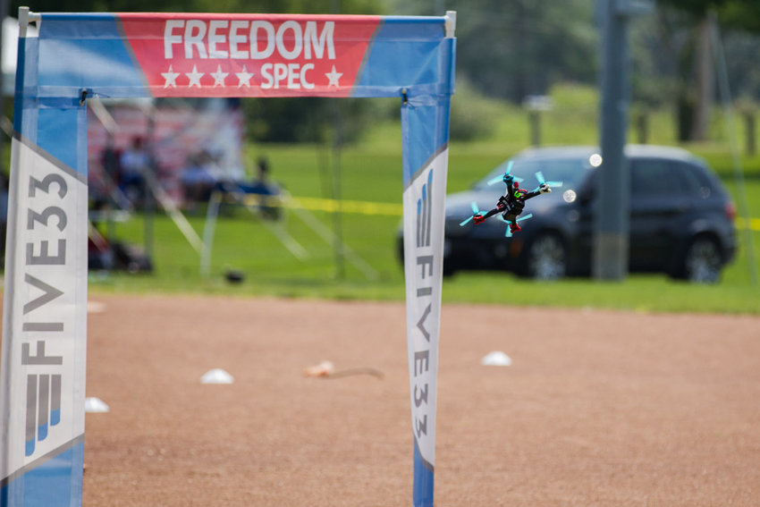 A drone flies toward a Freedom Spec gate during races last year in Moberly. Drones have been part of the Moberly July 4 celebration for five years, the last three as part of the Freedom Spec series.