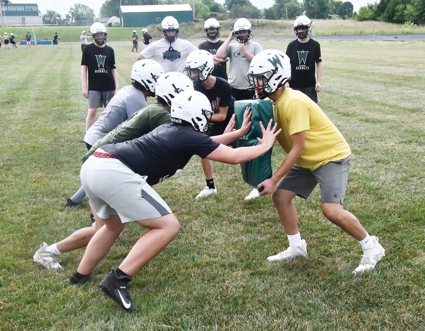 The Westran High School offensive and defensive lines square off on Monday during the inaugural practice of the 2022 season. The training session began at the ripe early time of 6:30 a.m.