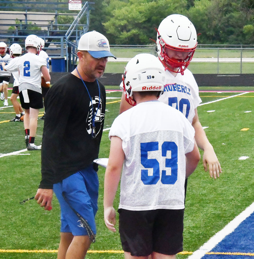 Moberly High School head football coach Cody McDowell works with the offensive linemen during the first official practice of the season on Monday, Aug. 8, at Dr. Larry K. Noel Spartan Stadium. McDowell said the 2022 schedule will be a challenging one, leading off with Smith-Cotton at Sedalia on Friday, Aug. 26.