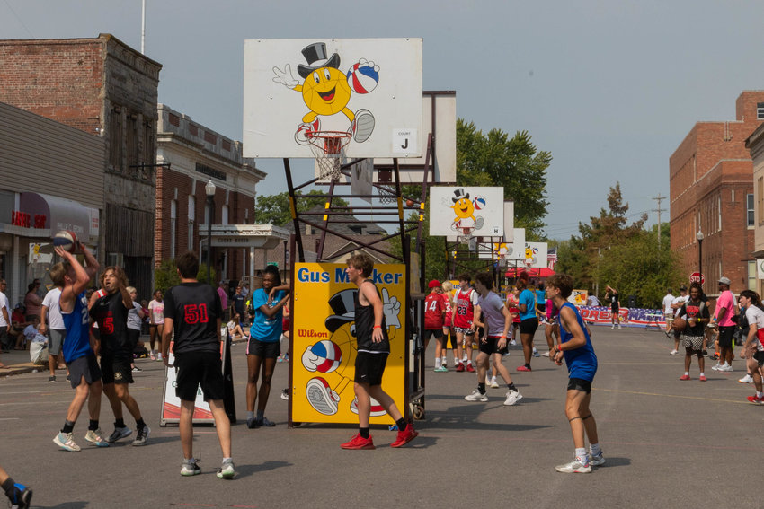 In this September 2022 file photo, the Gus Macker basketball tournament fills Williams Street during Moberly's Junk Junktion.