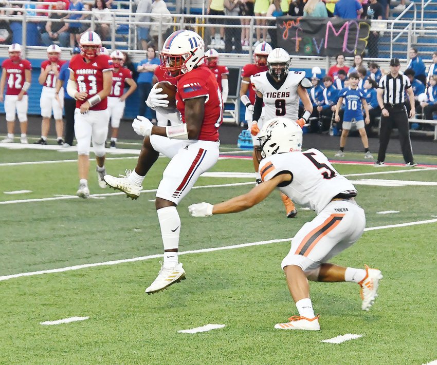 Moberly High School wide receiver Derieus Wallace makes a catch during the Spartans&rsquo; opening drive of the first half on Friday at Dr. Larry K. Noel Spartan Stadium. Moberly suffered a 34-14 loss to Kirksville, and it spoiled a fine game for Wallace with a season-high 10 receptions.