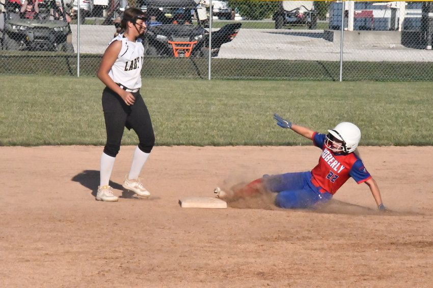 Macy White slides into second base during the Cairo Tournament championship game versus the host.