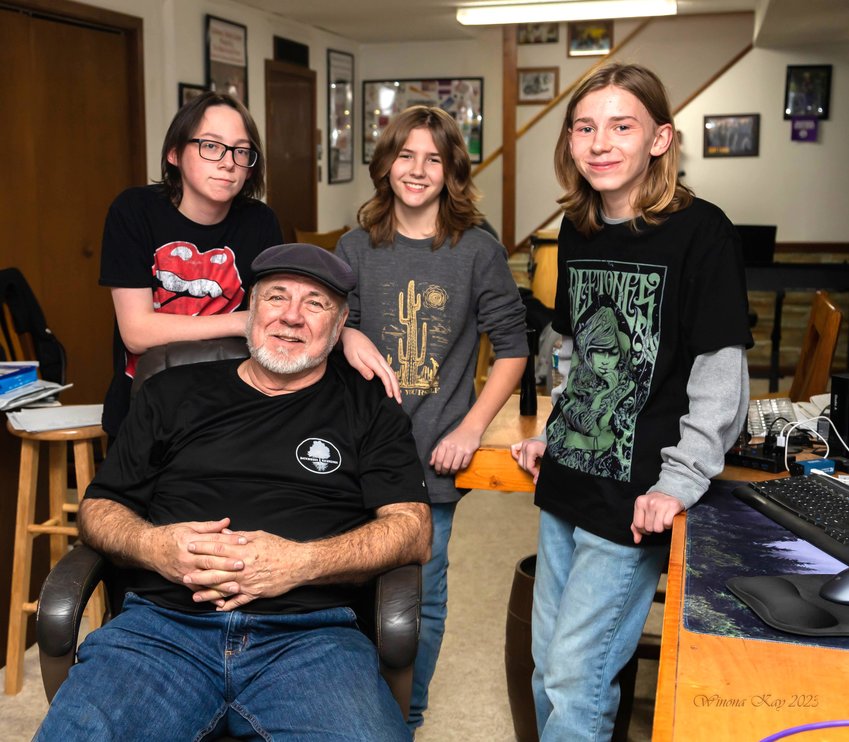 Members of Concannon pose with Darrell Lampkins at Backwoods Recordings near Higbee. From left are drummer Kai Alexander, Lampkins, bassist Jacob Ayer and lead guitar and vocalist Brody Vestal.