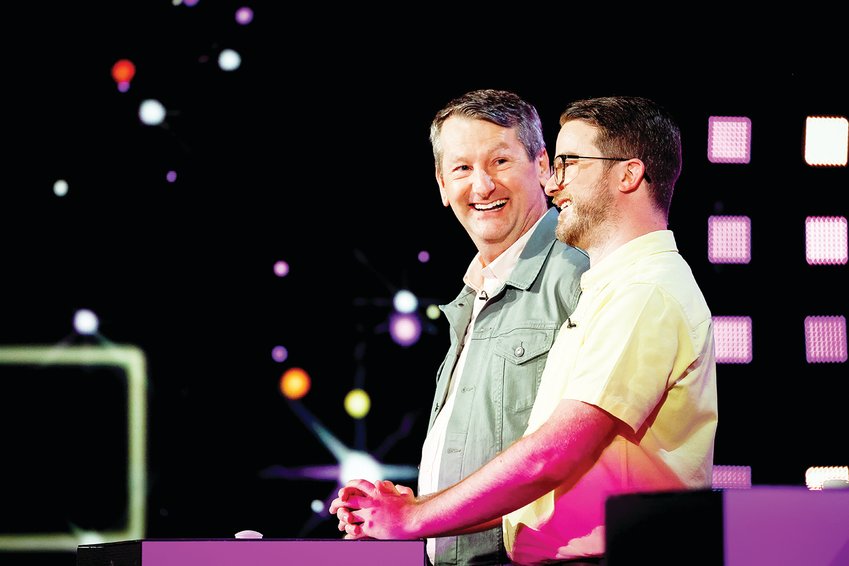 Higbee native and Indianapolis resident Jim Spilman reacts along with his son, Luke, during taping of the game show &quot;Lingo.&quot; The Spilmans appeared on the show last Wednesday, March 15.
