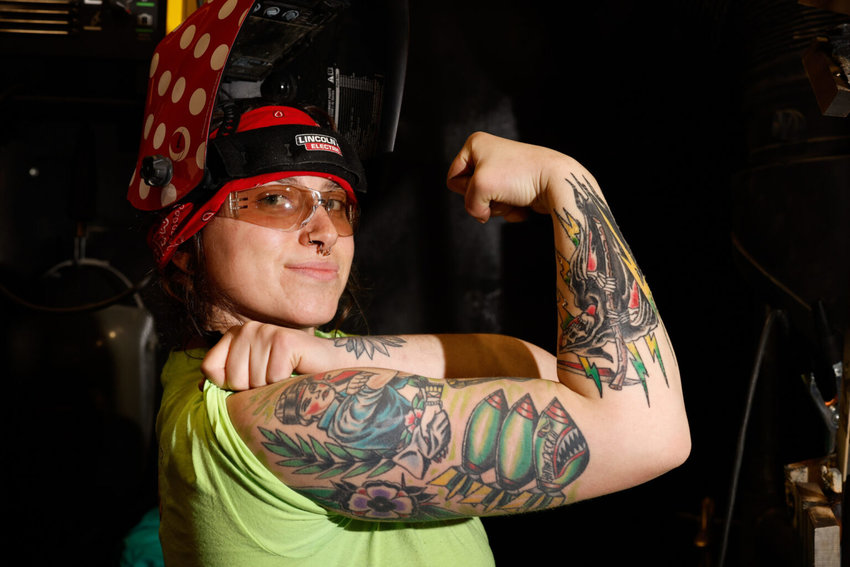 Ironworker apprentice Natalie Bell displays her Rosie the Riveter tattoo that she describes as a symbol of strength, March 22 at the Iron Workers 172 Training Center in Columbus, Ohio.