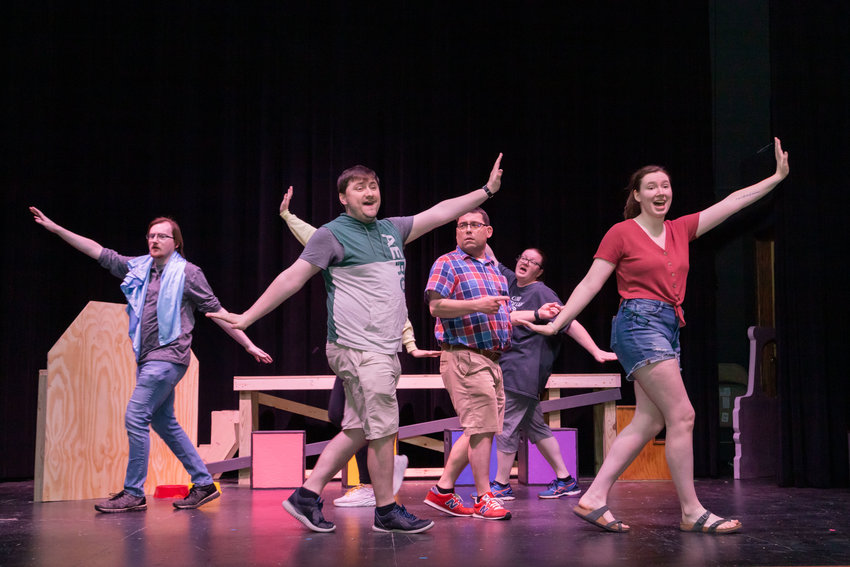 Charlie Brown (Ian Linenfelser) looks confused as Linus (Nate Gard), Schroeder (Leo Hammond), Sally (Camille Blanford) and Snoopy (Vickie Fischer) dance around him during a rehearsal for &ldquo;You&rsquo;re a Good Man, Charlie Brown&rdquo; which opens April 21 at 4th Street Theatre in Moberly.