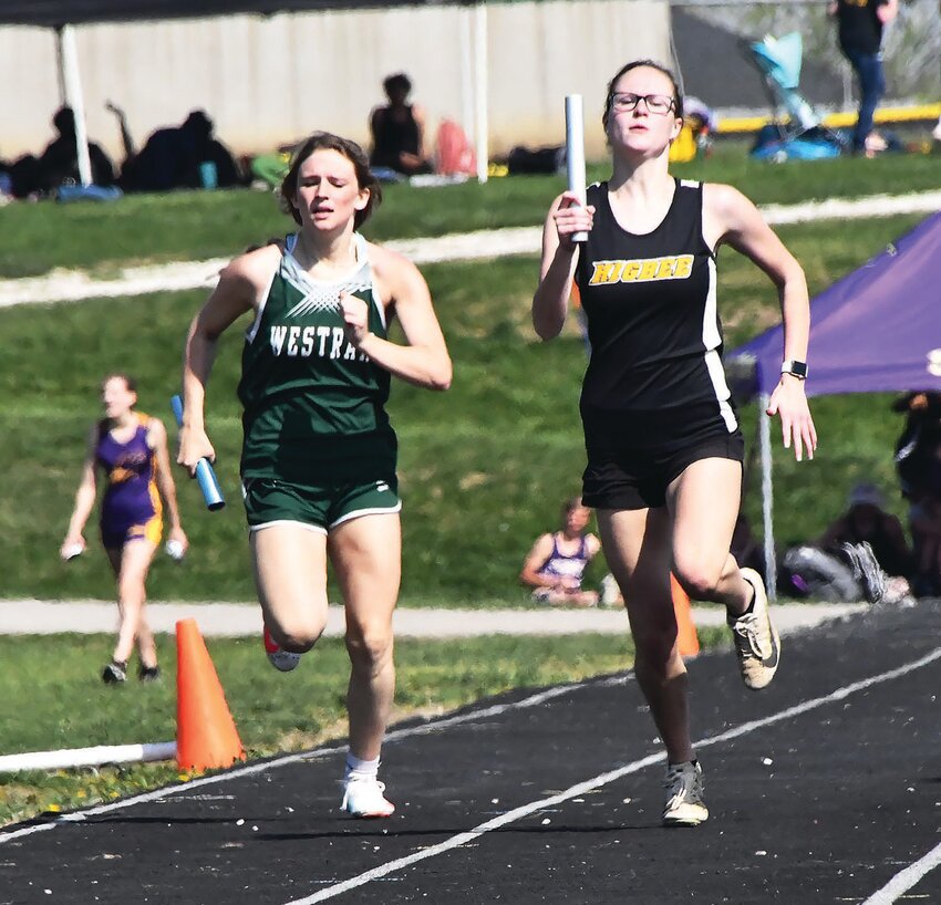 Westran's Kylee Hayes and Hailey Derboven from Higbee ran anchor legs for their respective schools during the girls 4x200-meter relay at the Westran Relays in Huntsville on Thursday, April 13.