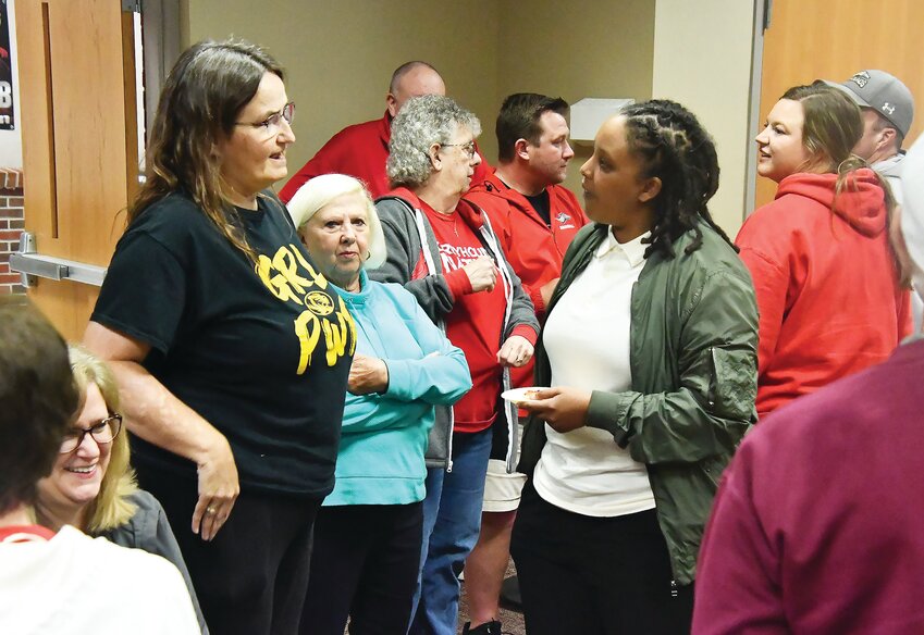 Leslie Wolverton (left) and Judy Wetrich (center) talk with new Moberly Area Community College head women's basketball coach Erika Harris during a special meet-and-greet event on Monday, May 15, at the Activity Center.