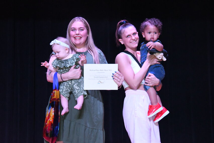 Parker Turner (left) and Yezzy Miller were named the grand champion baby girl and baby boy, respectively, at the Baby Show on Thursday during Railroad Days 2023.