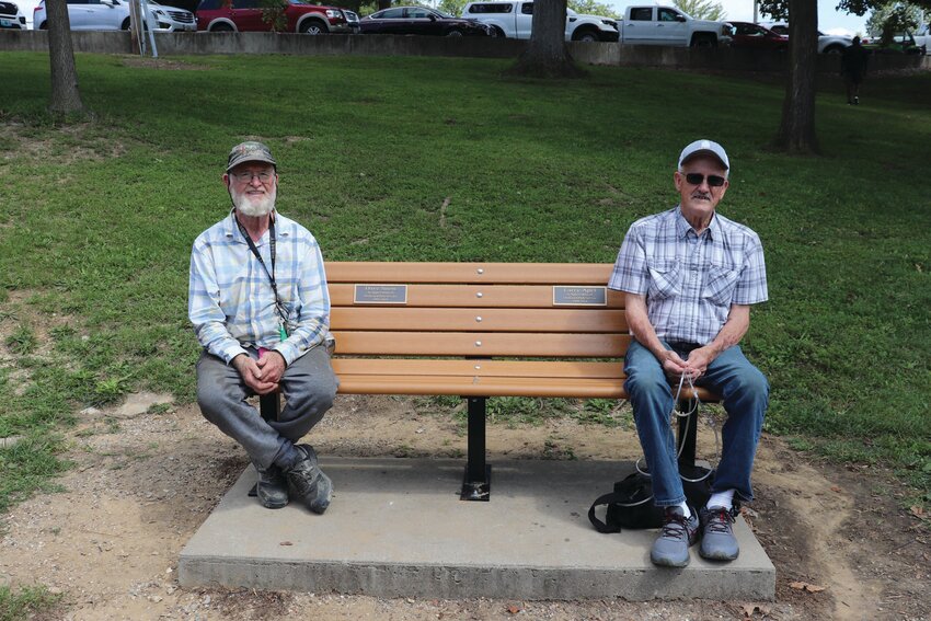 A bench dedication ceremony was held Aug. 30 at Candy Cane City in Rothwell Park in Moberly to recognize Dave Snow, left, and Larry Apel for their nearly 30 years of service to the Moberly Parks and Recreation Department.Submitted photo.