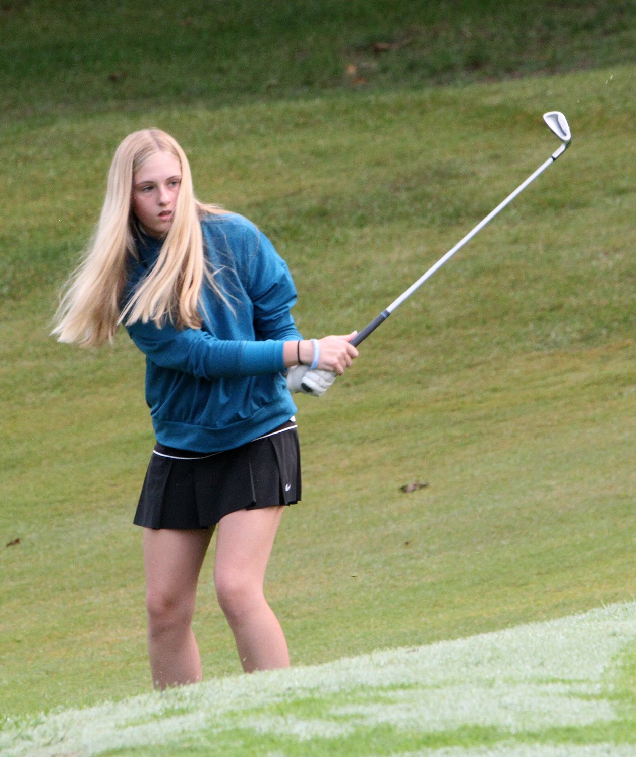 Westran High School's  Vallie Schermerhorn watches her chip shot toward the green on hole no. 6 during a golf meet played last fall at Moberly's Heritage Hills Golf Course. Schermerhorn is one of four returning girls to the varsity golf team who are all sophomores this 2021 fall season.