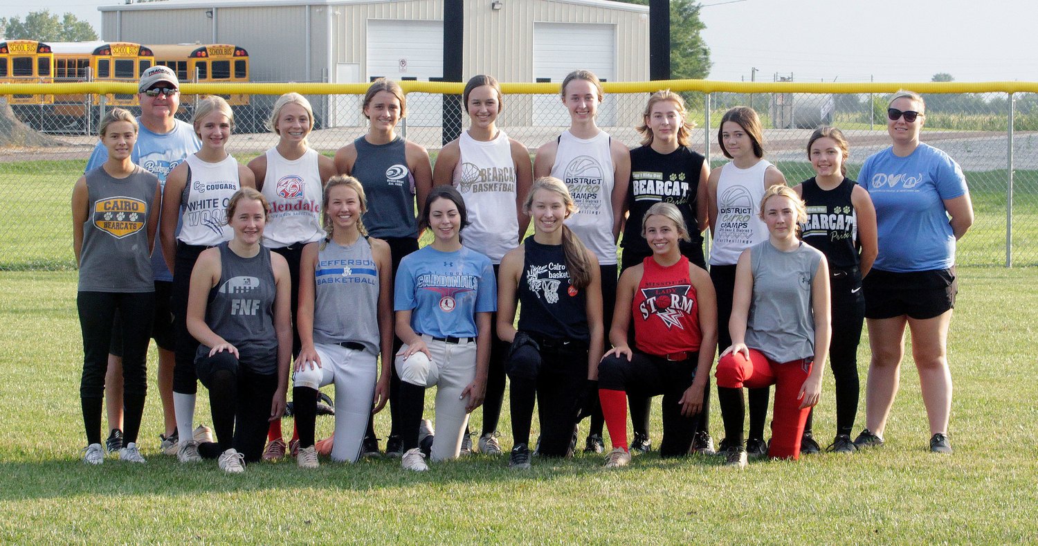 The Northeast R-IV School at Cairo varsity softball team for the 2021 fall season consists of juniors Gracie Bailey, Iszy Zenker and Darcy Pierce; senior Morgan Taylor; juniors Gracie Brumley and Abi Ogle. Second row members are head coach Brian Winkler; freshman Kristen Gosseen, Addison Bailey, Avery Brumley; sophomore Jersey Bailey; freshman Paige Westhues; sophomores Lilly Westhues and Ember Niemeier; freshmen Jewell Cole and Lauren Schoonover; assistant coach Jennifer Matthews. Not shown is freshman Alex Lucas.