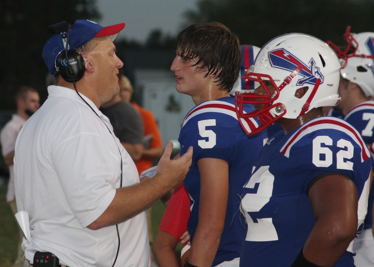 While serving as Spartans football offensive coordinator, Sam Richardson is shown giving advice to Moberly quarterback Ben Stoecklein during an Aug. 26, 2011 home game. Sam, 53, passed away July 31, 2021.