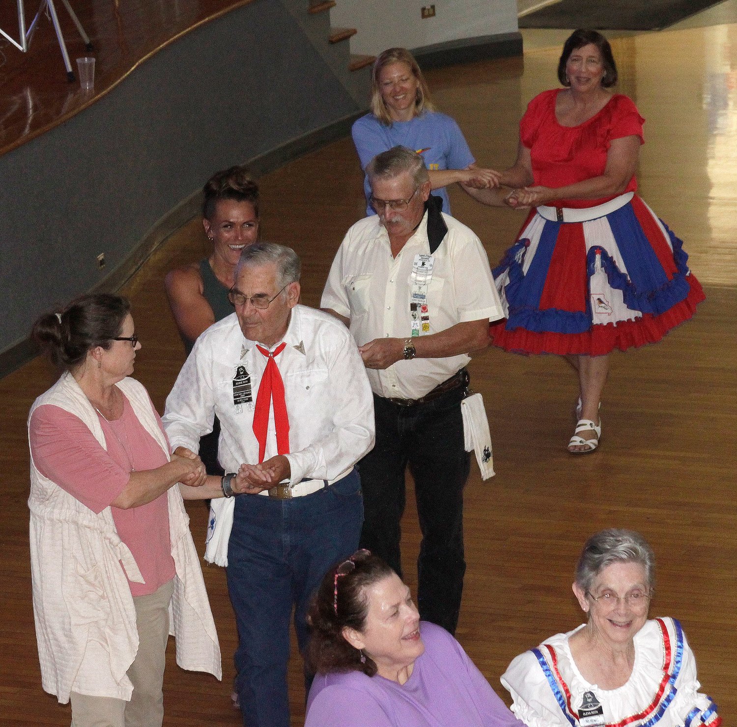 Roughly 60 persons participated in a Thursday, July 8 evening workshop to learn basic fundamentals of square dancing offered at the Moberly Municipal Auditorium. The event was free and open to the public and was co-sponsored by Little Dixie Regional Libraries and Moberly Parks and Recreation Department. Members of Little Dixie Square Dance Club were present to help teach dance moves and interact with participants.