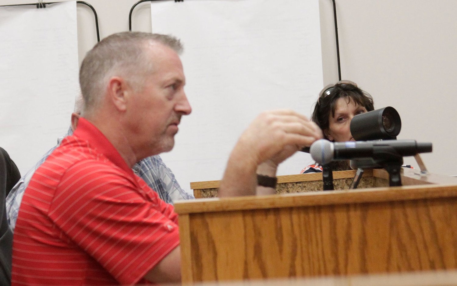 Moberly Community Development Director Tom Sanders responds to questions from the city council during a June 21 business meeting held at City Hall.