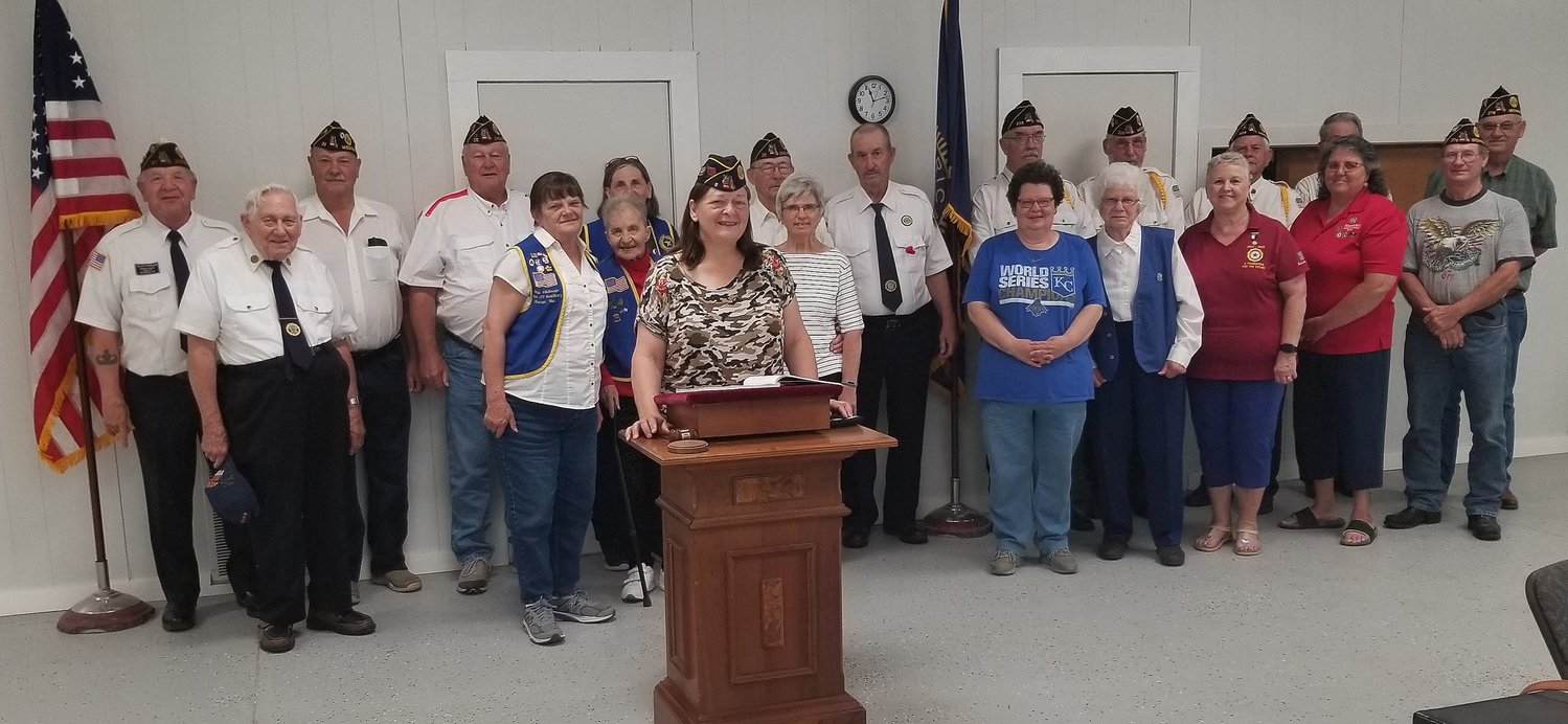 Phyllis Campbell of Clifton Hill was elected as the new Missouri American Legion District 2 Commander at a June 5 quarterly meeting held a Milan Sullivan County Memorial Post 228. Campbell, who is shown standing at the podium,served in the Air Force and the Missouri Army National Guard. During this business meeting legionnaires and auxiliary members discuss Boy and Girl State programs, legion baseball and student oratorical contests.