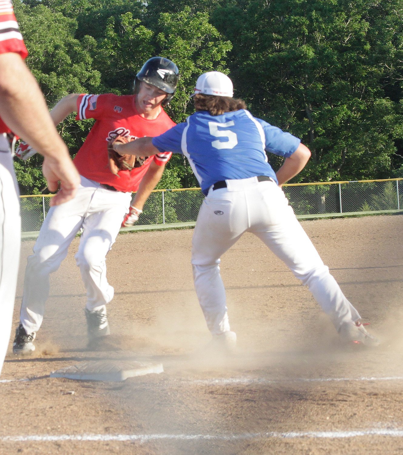 NEMO Post 6 Sixers third baseman Tanner Pipes places a tag to record an out on Hannibal Post 55 runner Mason Thorp when Thorp attempted to steal in the top of the third inning Wednesday. NEMO Sixers won the first game 4-3 but lost 12-9 to Hannibal in the second contest.