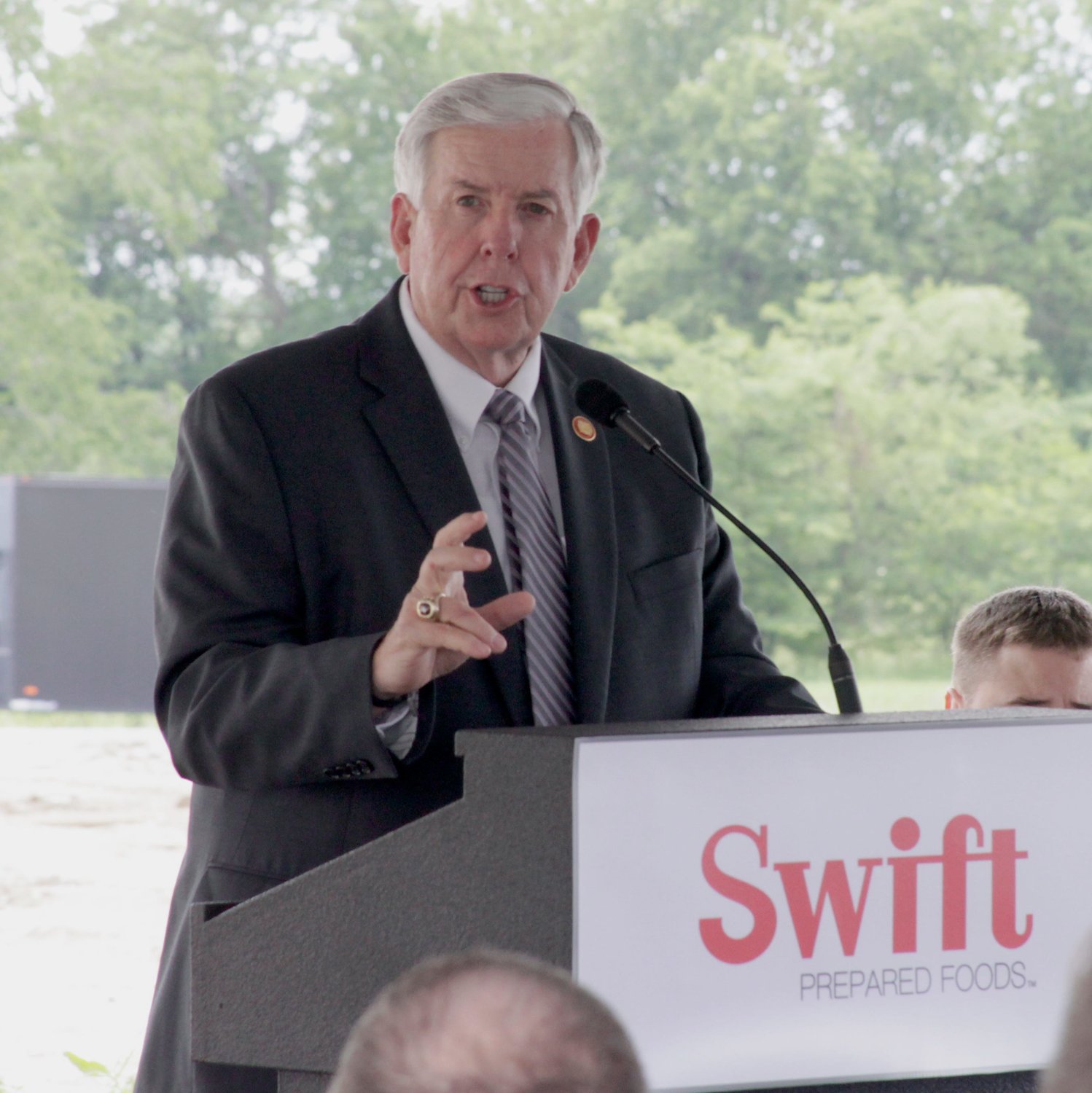 Missouri Governor Mike Parson informs the estimated 75 persons that gathered in Moberly on Monday, May 24 to celebrate the opening of the new Swift Prepared Foods facility about how strong the state's economy recently been.