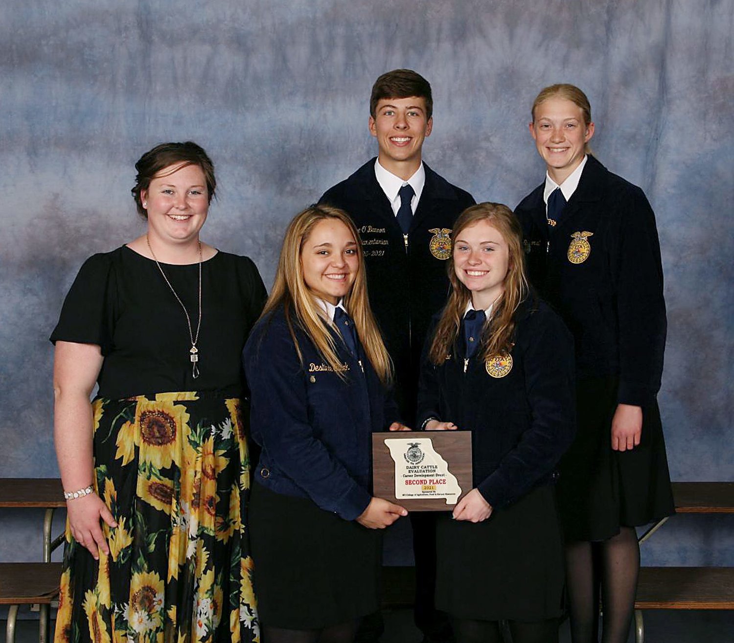 Madison High School's FFA Chapter membes consisting of (front row) teacher/advisor Katie Wantland, and students Peyton Hook, Mallory Greiwe,  and (second row) Joe O'Bannon and Hunter Stockhorst, placed second in the dairy cattle evaluation and management career development category at the 2021 Missouri FFA State Convention held April 30 – May 1 in Sedalia.