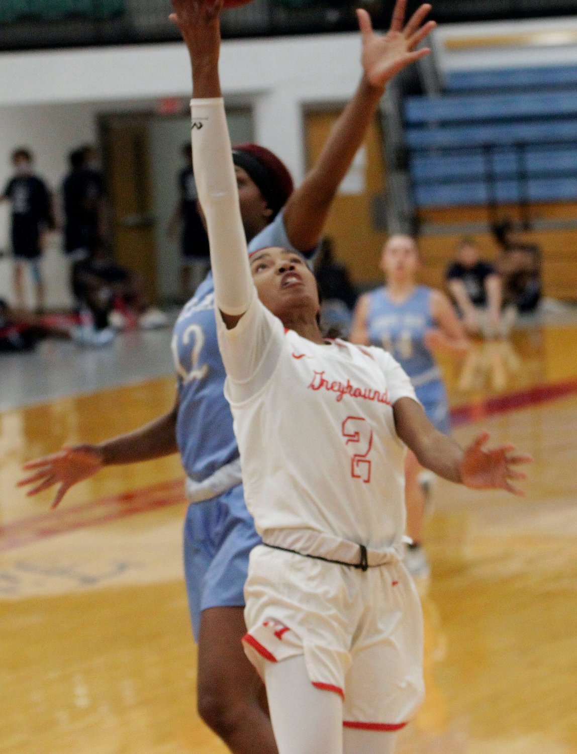 Bryce Dowell of the Moberly Area Community College Greyhounds scores two of her game-high 18 points in transition Saturday, helping the Lady Greyhounds keep State Fair CC winless this 2021 season when MACC punished their Region 16 guests 101-38.