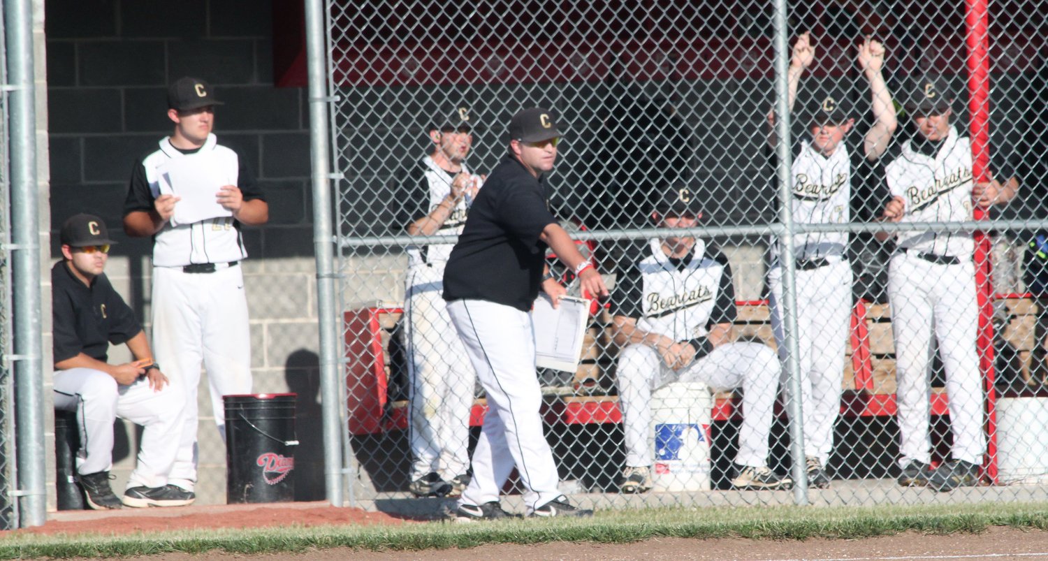 Cairo Bearcats head baseball coach Morgan Matthews stands in front of his team's dugout as he gives instructions during a game played in the 2019 season.