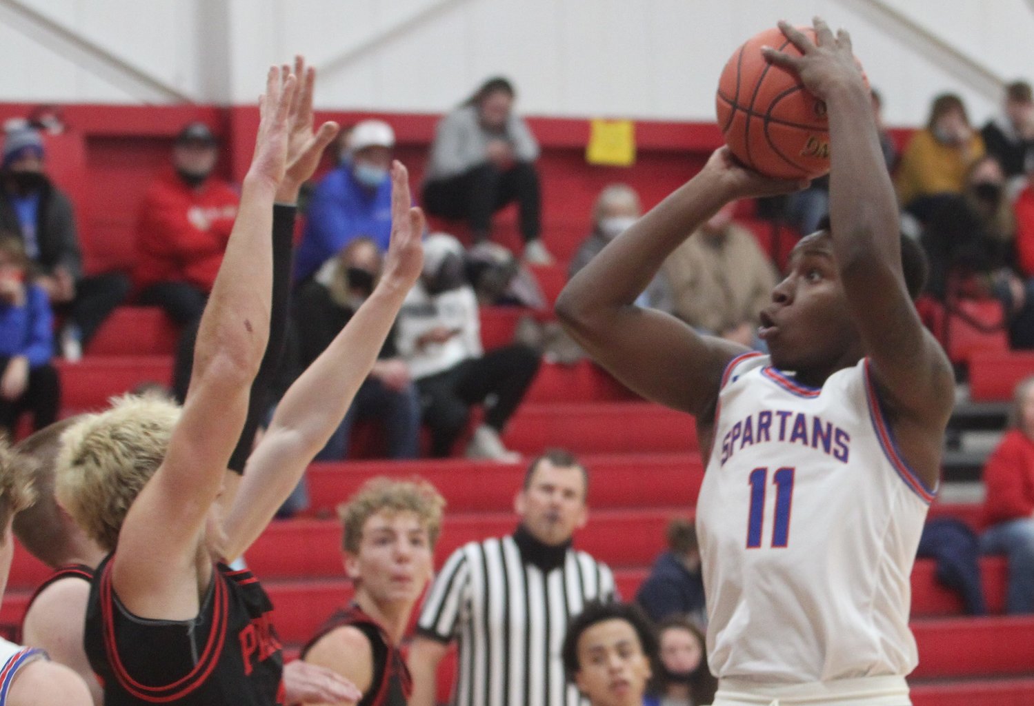 Moberly High School sophomore Derieus Wallace (#11) scored 12 points Tuesday during the Spartan boys season ending 65-49 loss to Kirksville in a Class 5 District 15 semifinal game.