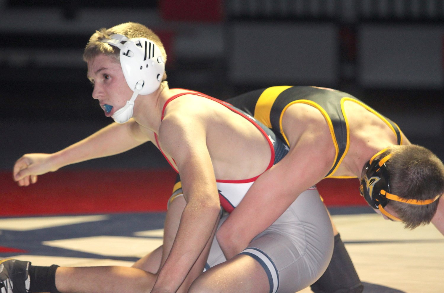 Moberly High School sophomore Hunter Boots, left, works to escape the grasp of his 126-pound opponent during a Jan. 26 home match. Boots placed seventh in his weight class Saturday when the Spartans were one of 12 schools that participated at the Benton Tournament.