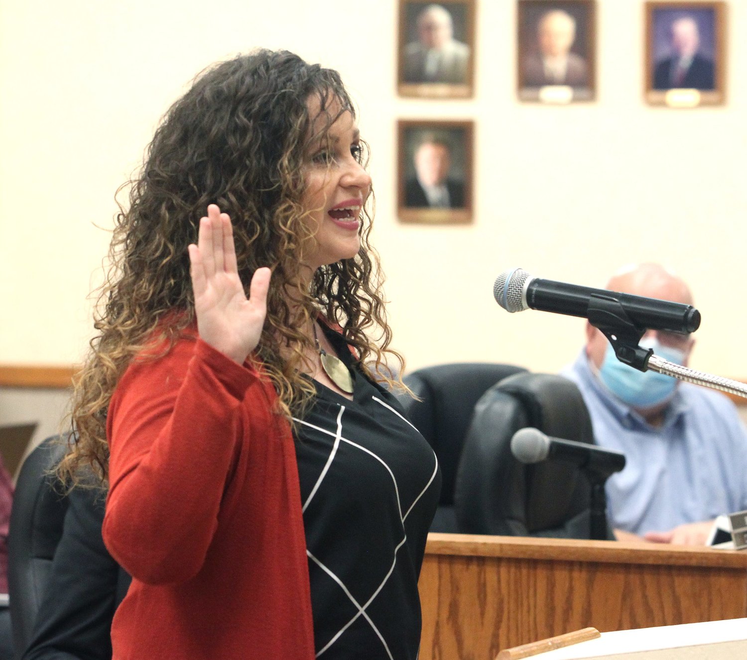 Shannon Hance accepts the oath of office to become the new city clerk during Monday's city council business meeting. Hance transitions from being the deputy city clerk.