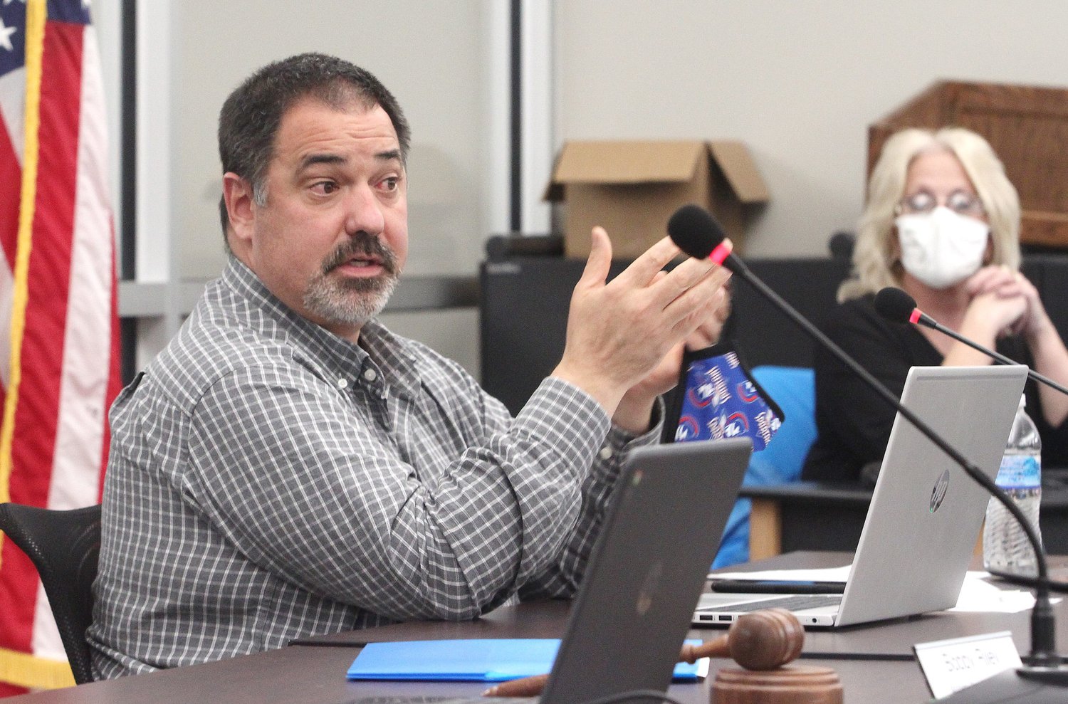 Moberly Public Schools Superintendent Dr. Tim Roling explains some agenda items Tuesday to school board members a meeting held at the high school. The district is considering to place a bond issue on the April 2021 election ballot that would not increase taxes.